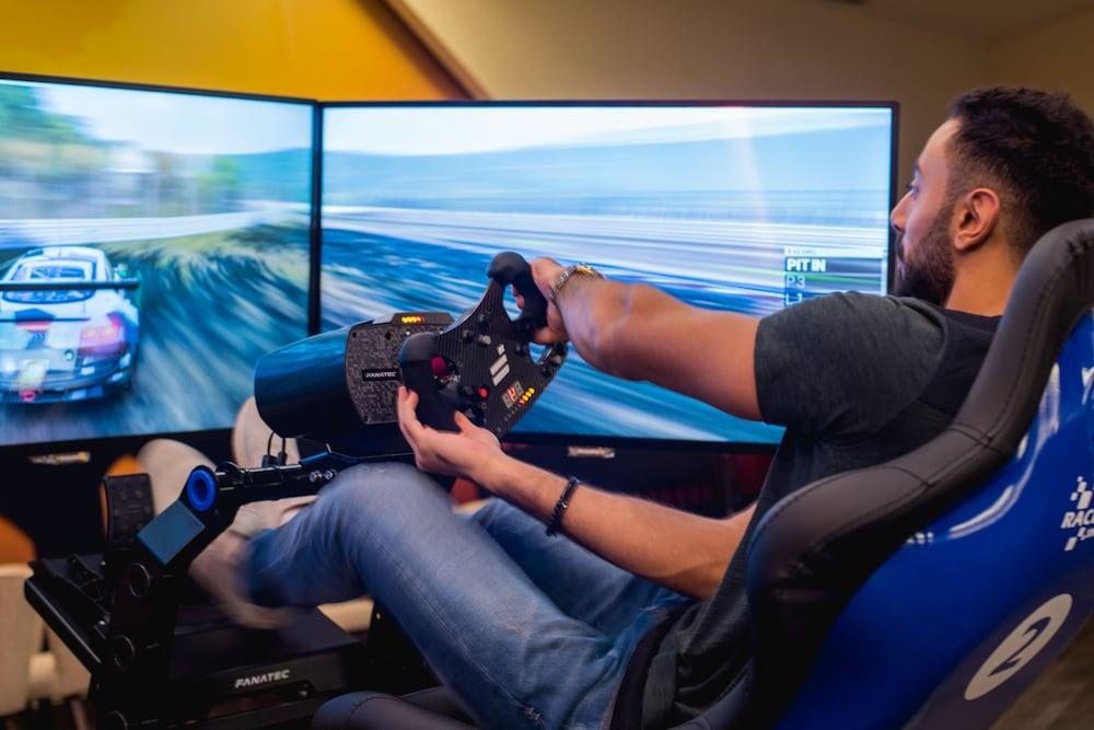 Bay La Sun Hotel&Marina - KAEC King Abdullah Economic City Bagian luar foto A racing game player using a steering wheel